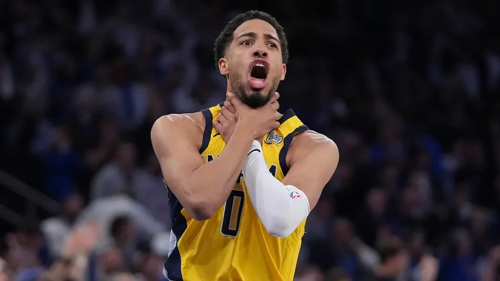Indiana Pacers star guard Tyrese Haliburton shows the choke sign